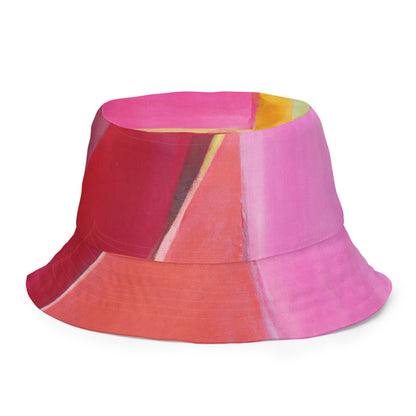 Sombrero de pescador reversible con estampado geométrico rosa, malva y rojo
